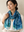 Woman wearing the Midnight Paisley silk scarf looped at the neck over a cream silk shirt, the ends falling long — Tangled Monk original hand-drawn silk scarf