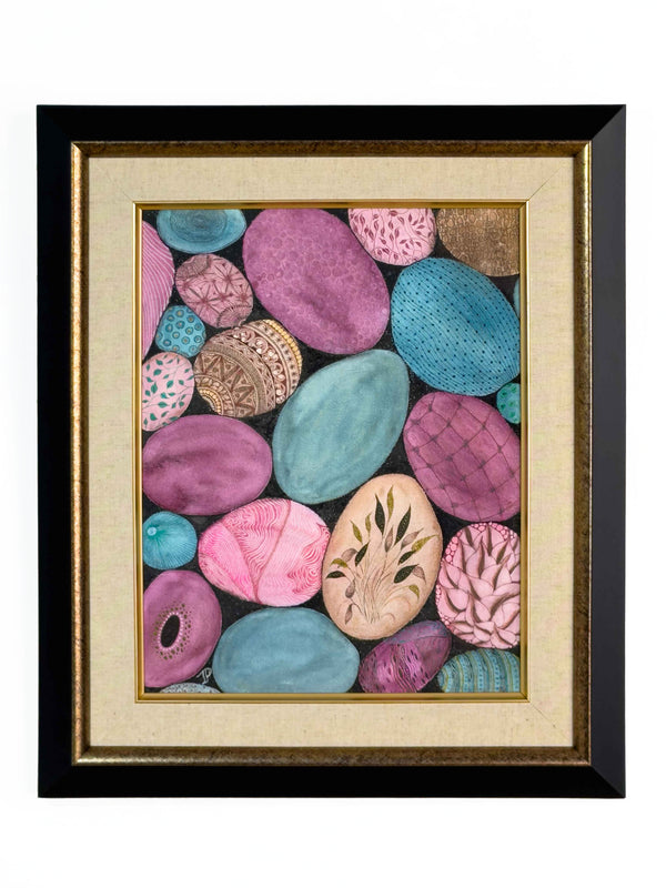 Framed painting of hand-painted pebble shapes in shades of mauve, pink and teal, each with a distinct textured pattern, on natural linen in a black and gold frame — Tangled Monk original hand-drawn art