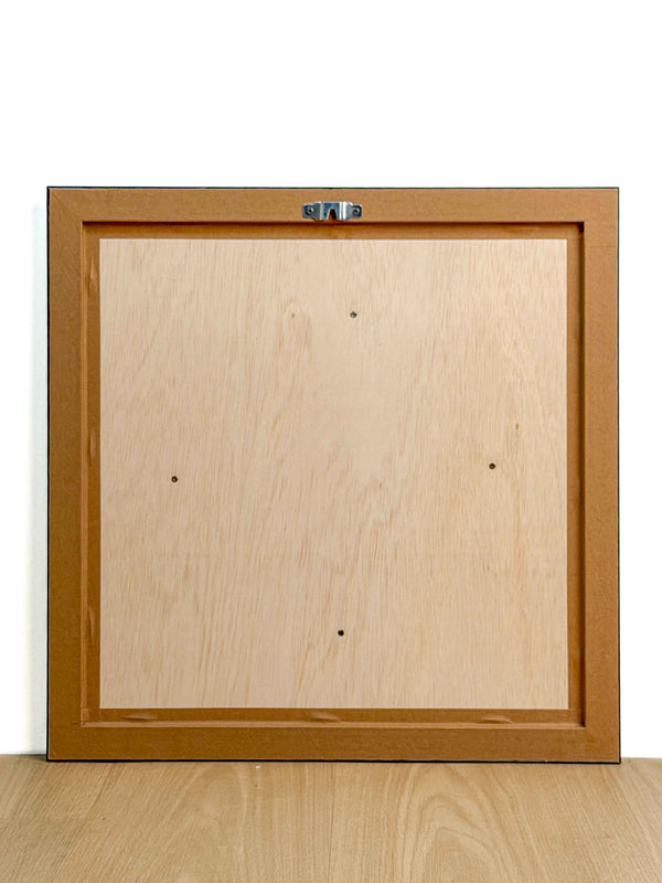 Reverse of the framed artwork showing the wooden backing board and metal hanging fixture — Tangled Monk framed wall art