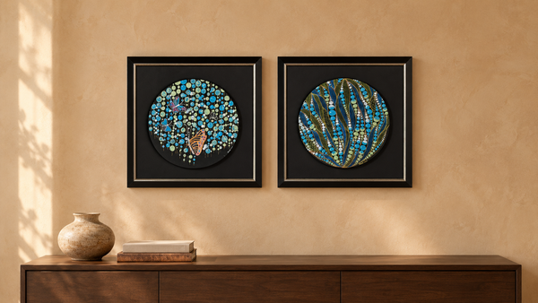 Lines of Life and In the Deep, two framed original artworks by Preetie Kohli from the Tides & Thickets collection, hung side by side above a wooden console — Tangled Monk wall art